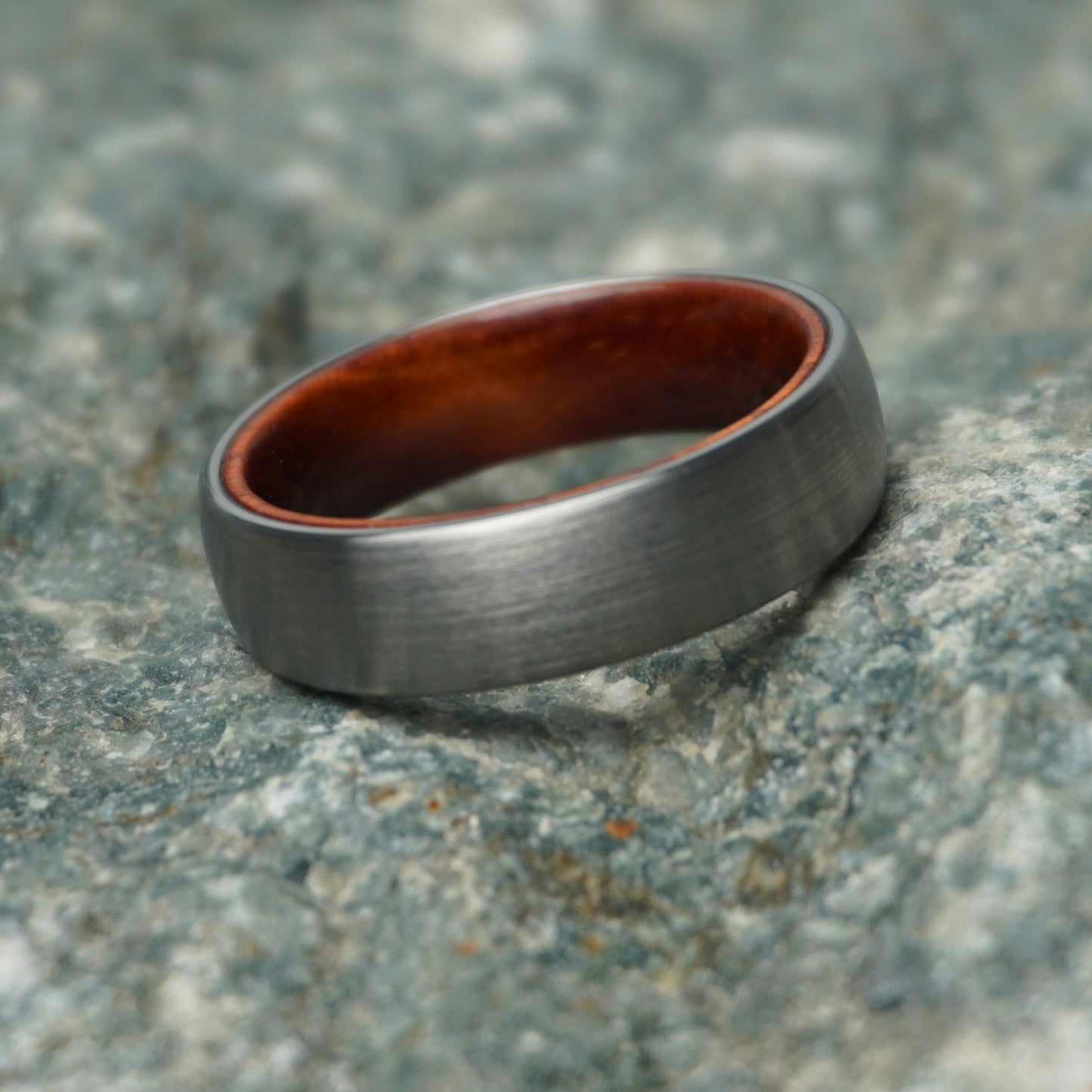 Durable 6mm comfort-fit domed ring with a brushed gray exterior and wooden interior by Forge and Lumber.