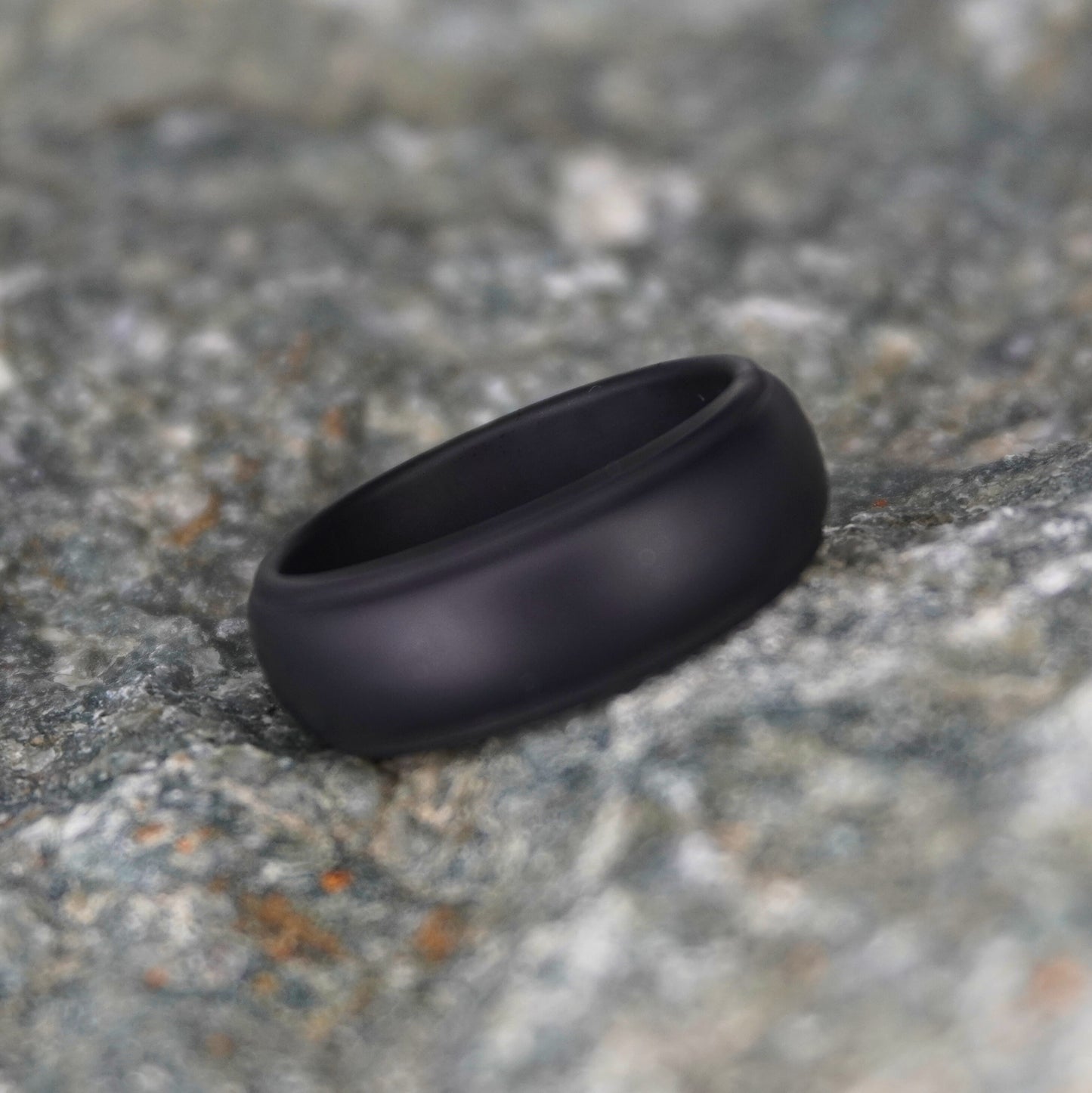 Black silicone wedding ring, 8mm beveled design, durable athletic band by Forge and Lumber