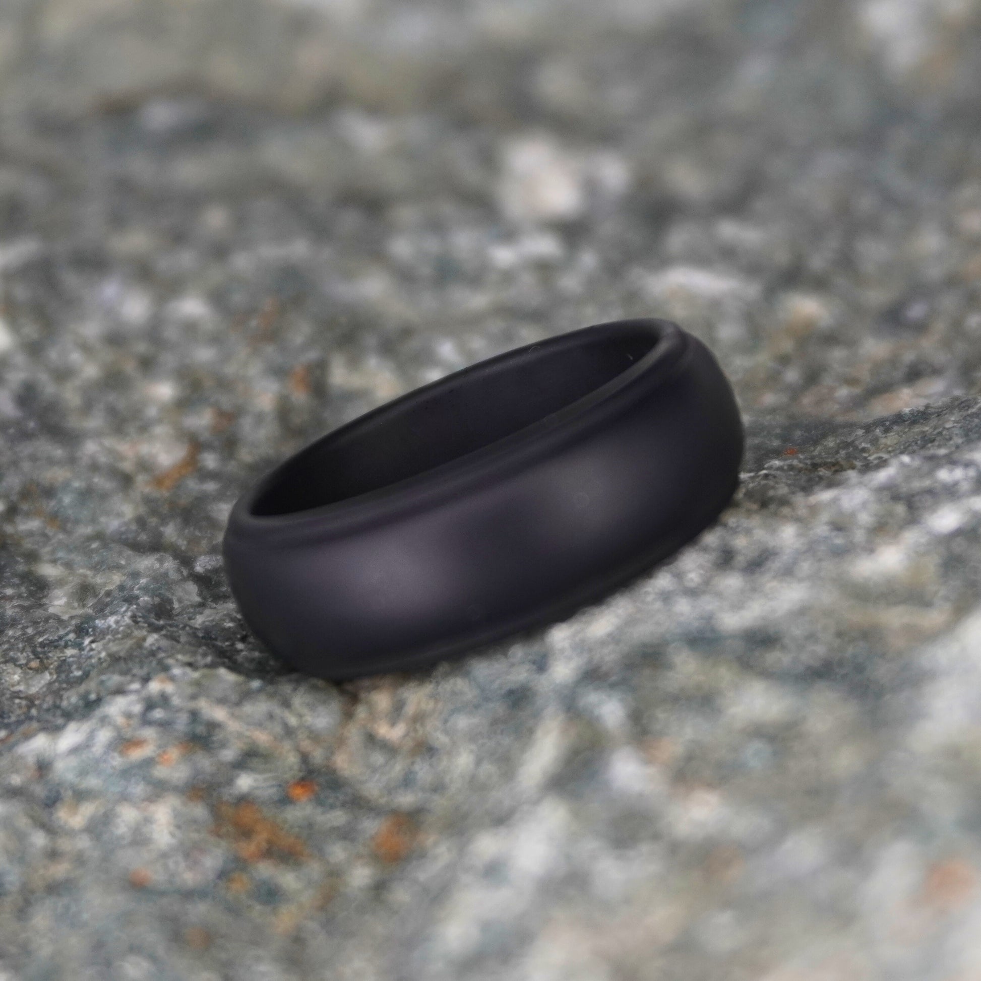 Black silicone wedding ring, 8mm beveled design, durable athletic band by Forge and Lumber