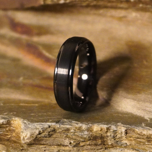 Black beveled ring from Forge and Lumber, 6mm width, available in sizes UK K to M.