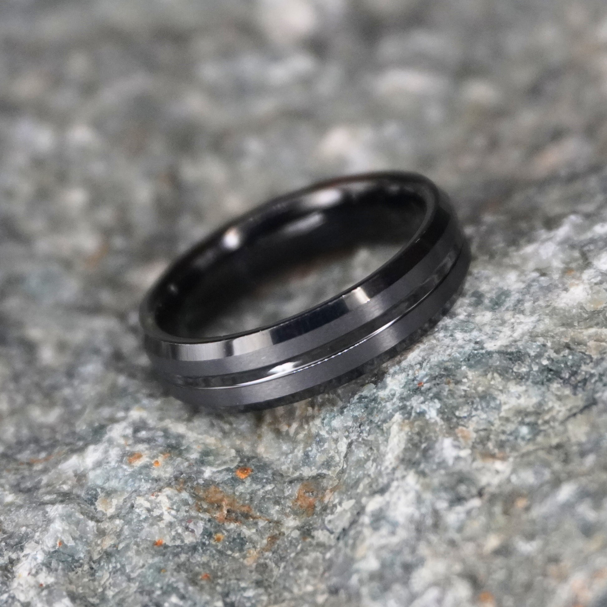 Brushed tungsten wedding band in black, 6mm beveled design by Forge and Lumber.