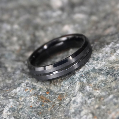 Brushed tungsten wedding band in black, 6mm beveled design by Forge and Lumber.