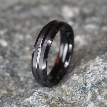 Black brushed tungsten wedding band with beveled edges, 6mm width by Forge and Lumber.