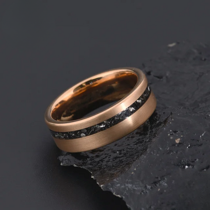 Rose gold 8mm wedding band with black stone inlay by Forge and Lumber.