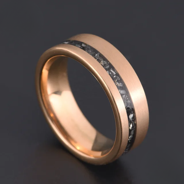 Rose gold 8mm wedding band with black inlay by Forge and Lumber.