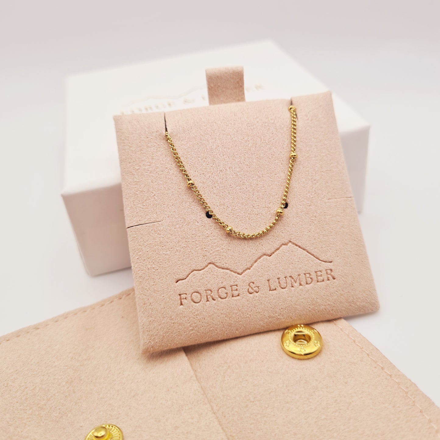 18K gold plated beaded necklace by Forge and Lumber, adjustable, tarnish-free, waterproof steel, 40cm length.