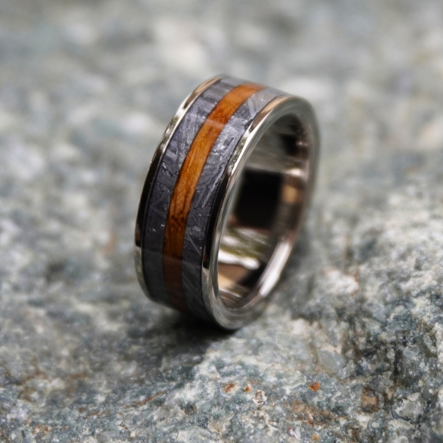 Artisan 8mm ring made from barrel wood and stainless steel by Forge and Lumber, featuring a cosmic design.