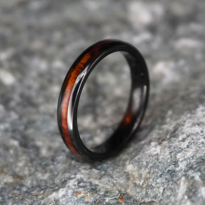 Black durable ring with a Hawaiian wood inlay, 4mm width, by Forge and Lumber.