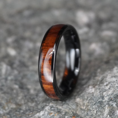 Black comfort fit ring with a wood inlay, The Warrior by Forge and Lumber, 6mm width.