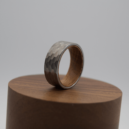 Hammered silver ring with wooden interior, from Forge and Lumber, available in sizes UK M, N, O.