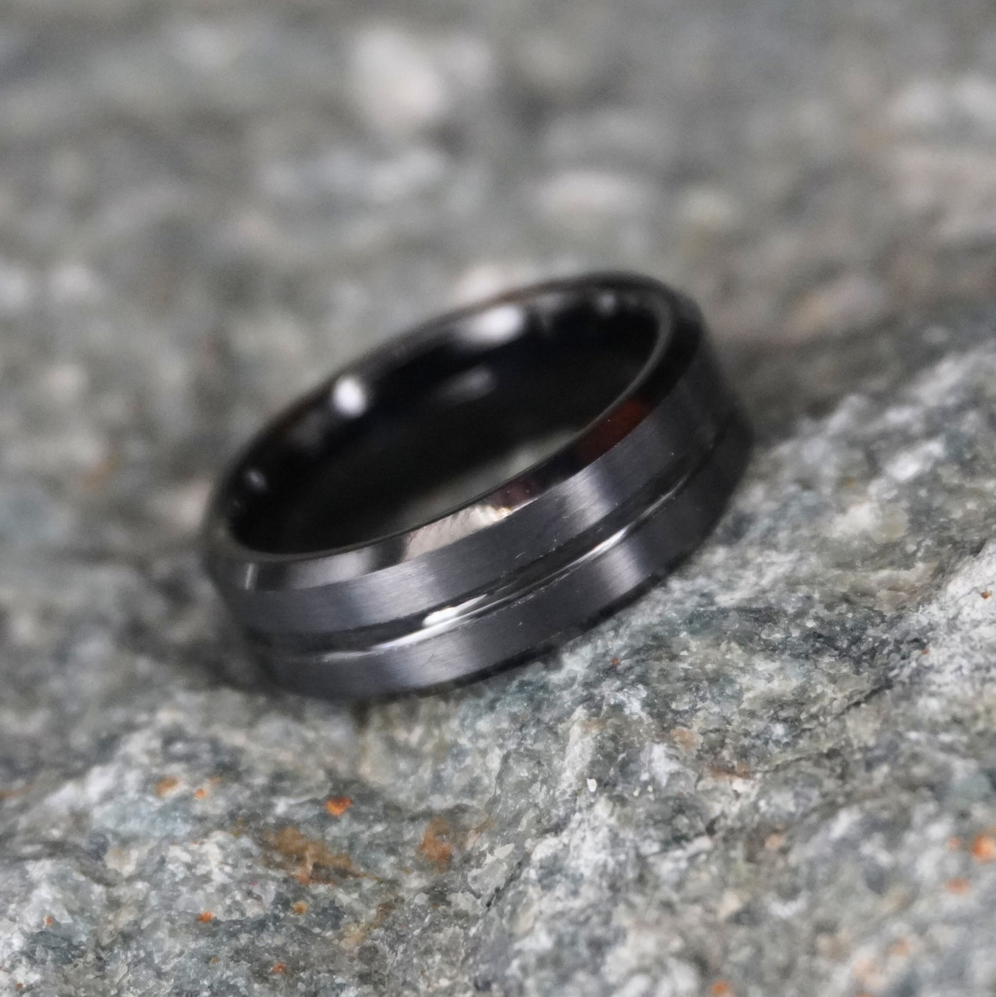 Beveled black tungsten ring by Forge and Lumber, 8mm width, available in sizes UK M, N, O.