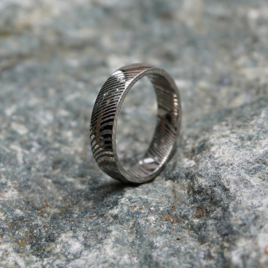 Damascus steel ring with artisan ripple design by Forge and Lumber, available in sizes UK N to P.