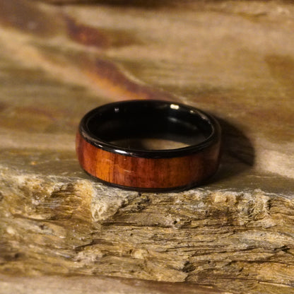 Black tungsten comfort-fit ring with 8mm width and wooden inlay by Forge and Lumber.