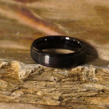 Black beveled ring from Forge and Lumber, 6mm, affordable luxury design.