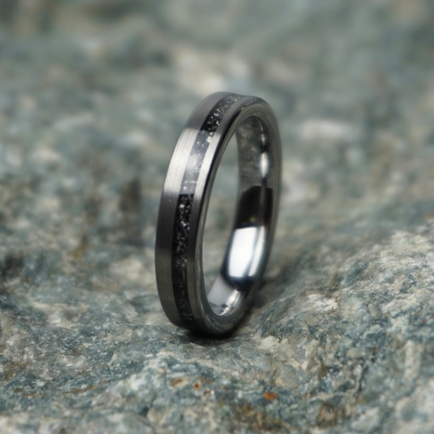 Forge and Lumber Nova 4mm black wedding band with celestial design and polished finish