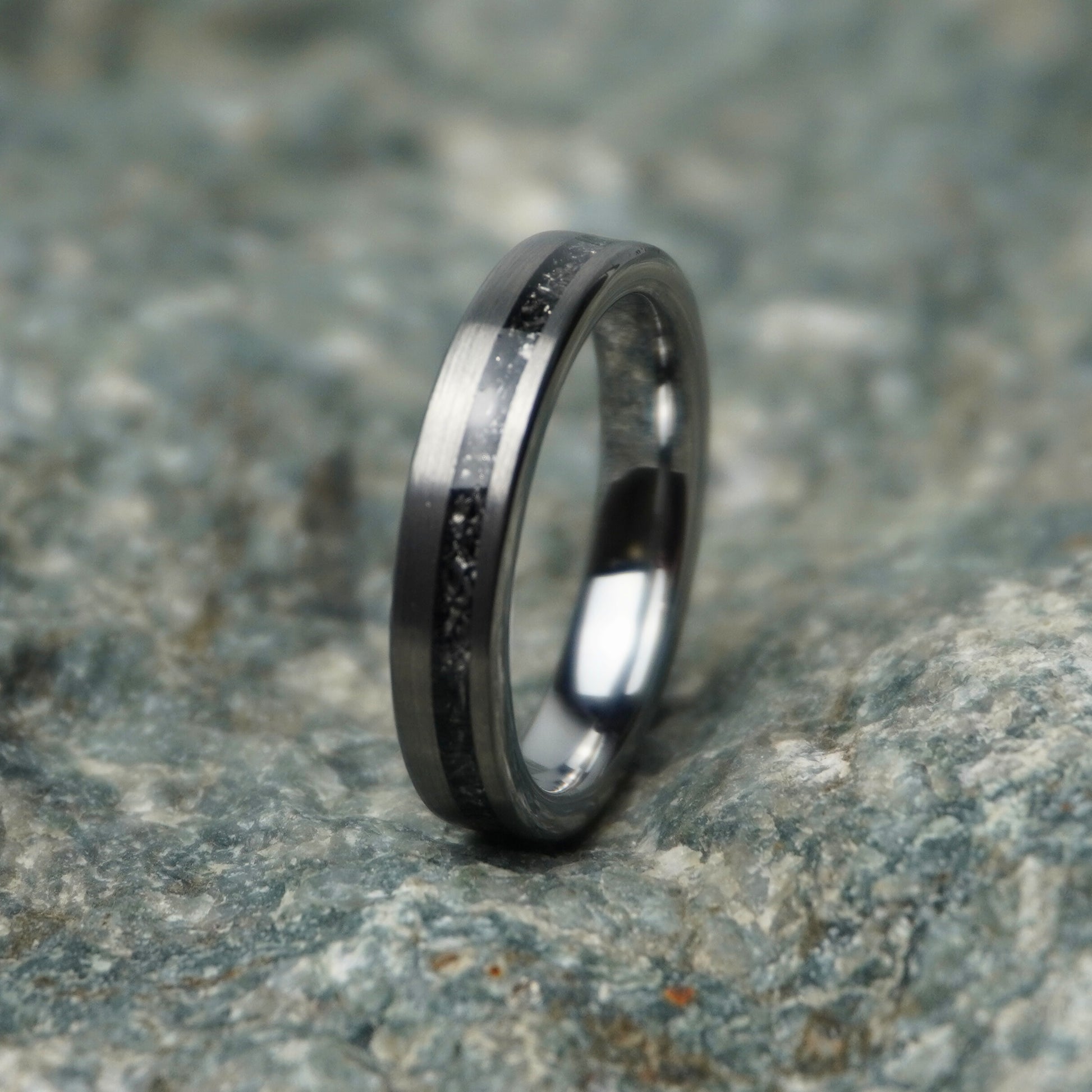 Forge and Lumber Nova 4mm black wedding band with celestial design and polished finish