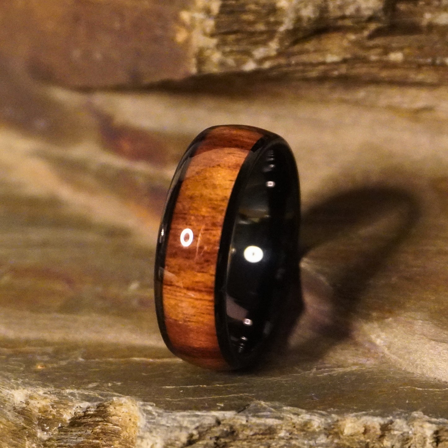 Black tungsten comfort-fit ring with 8mm width and wood inlay by Forge and Lumber.
