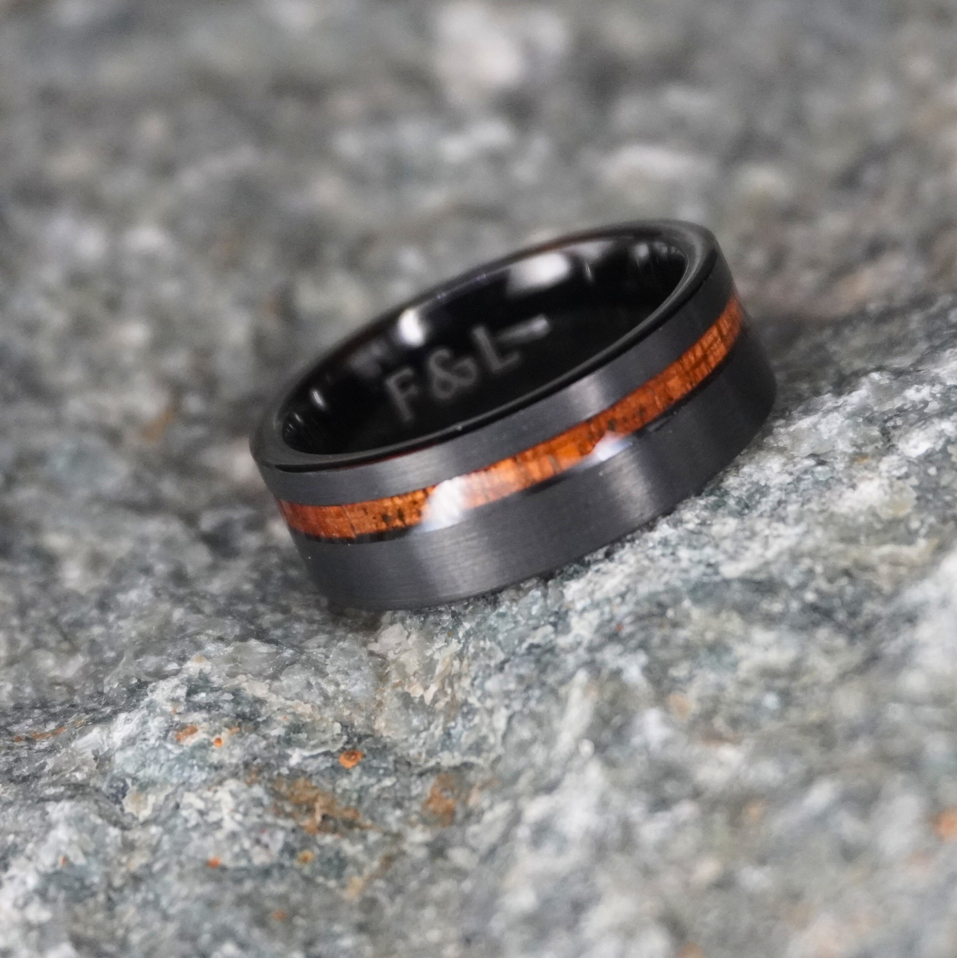 Black brushed finish ring with 8mm width and wood inlay by Forge and Lumber. Available in sizes UK M, N, O.
