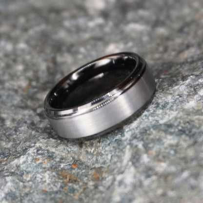 Beveled black tungsten ring by Forge and Lumber, 8mm width, available in UK sizes M, N, O.