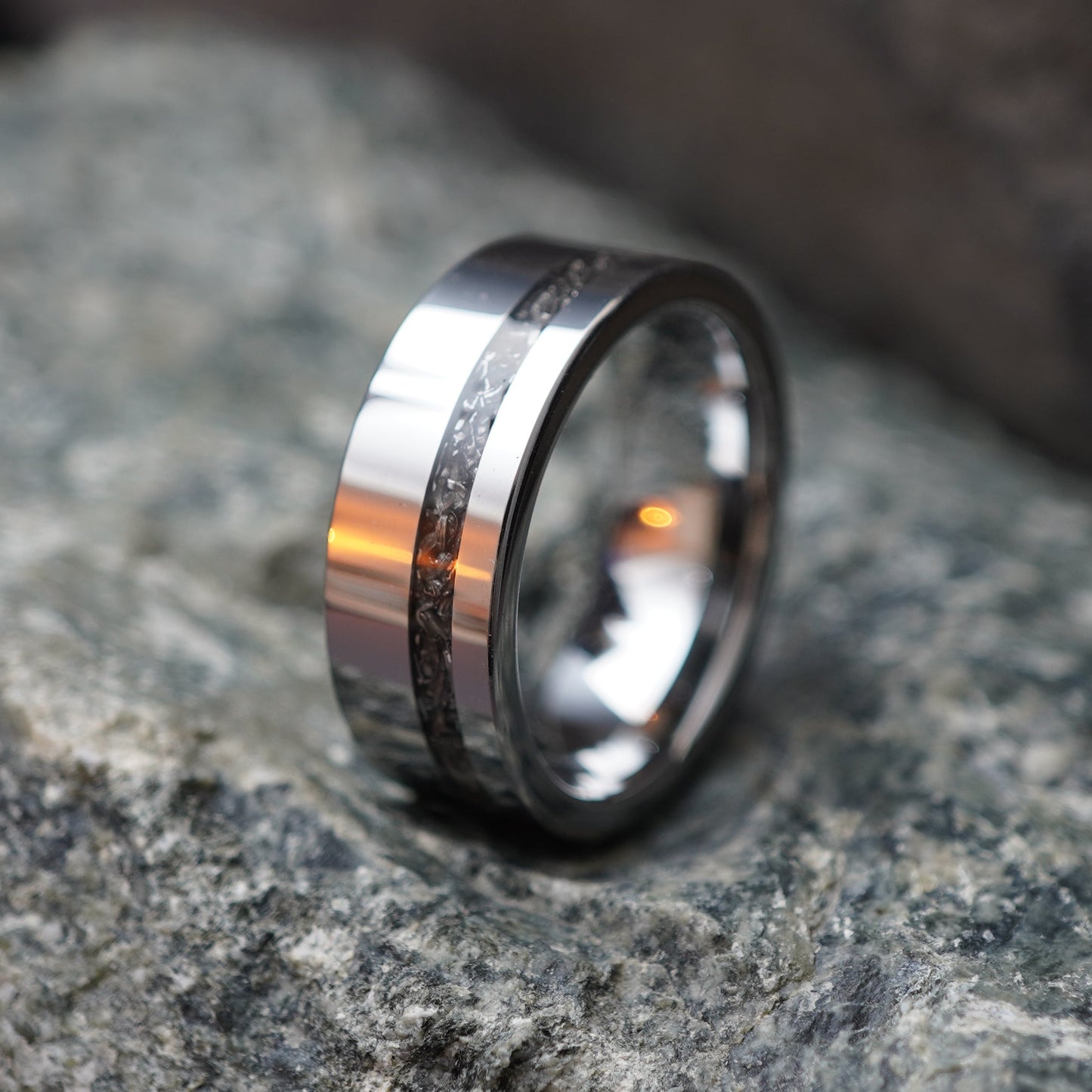 8mm alternative wedding ring from Forge and Lumber with a sleek metal finish and textured center
