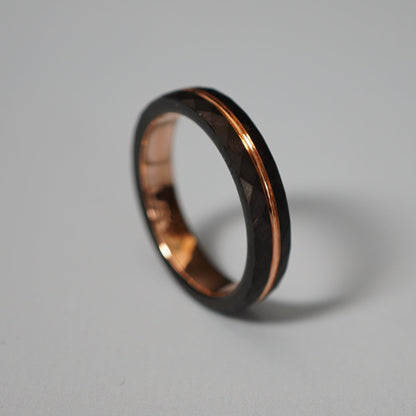 Black and rose gold engraved wedding band by Forge and Lumber, 4mm delicate design, available in multiple sizes.