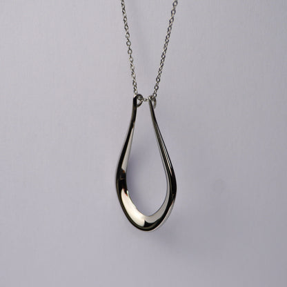 The Abalone ring holder necklace in silver, teardrop pendant on a fine chain