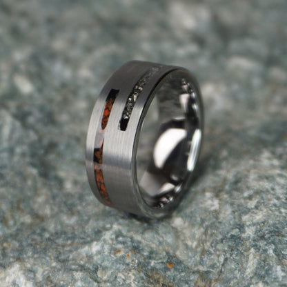 Engravable 8mm ring featuring cosmic Dinosaur Bone inlay, by Forge and Lumber, available in sizes UK M, N, O.