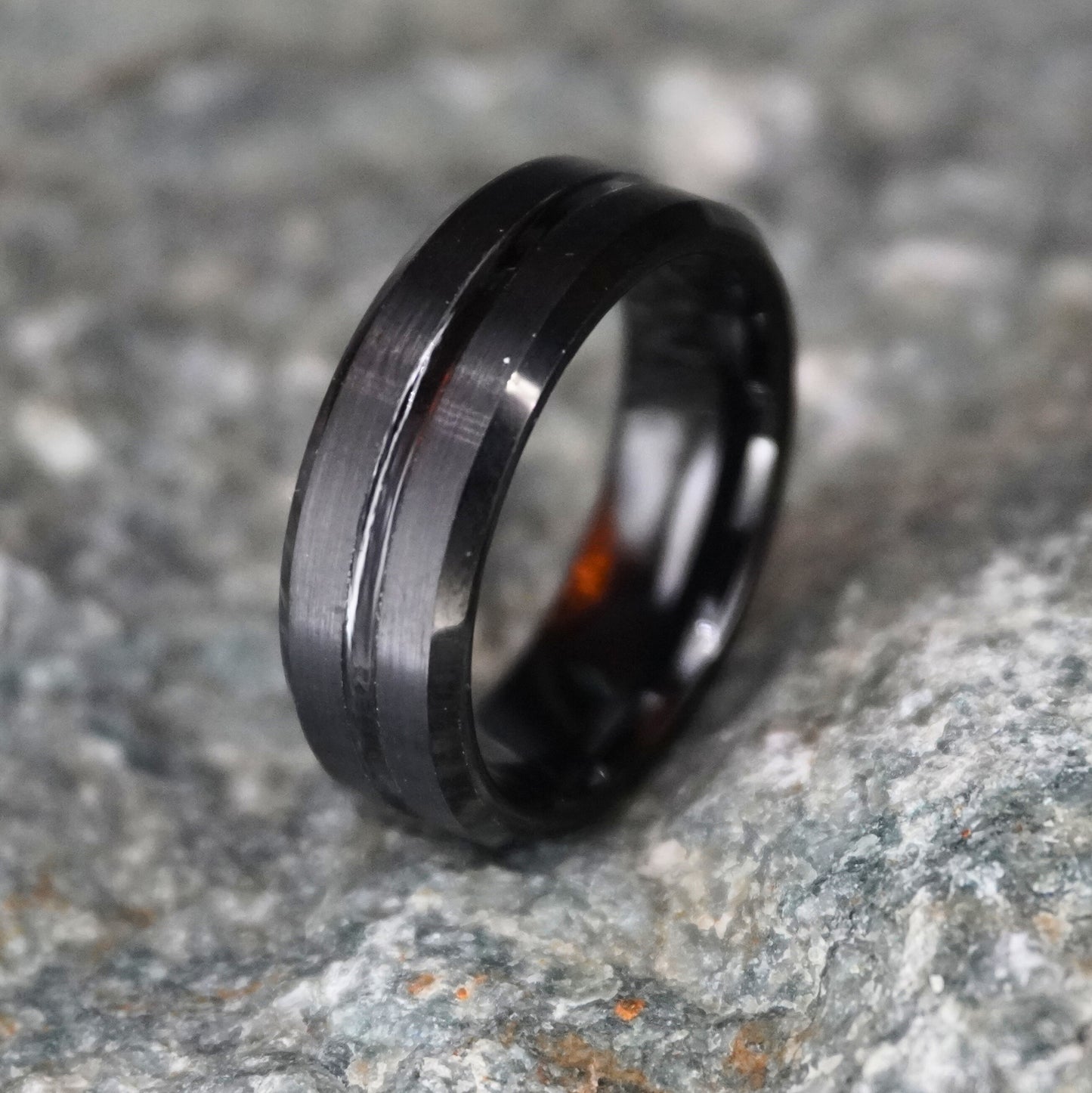 Beveled black 8mm ring from Forge and Lumber, available in sizes UK M, N, O (US 6, 6.5, 7).
