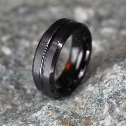 Beveled black 8mm ring from Forge and Lumber, available in sizes UK M, N, O (US 6, 6.5, 7).