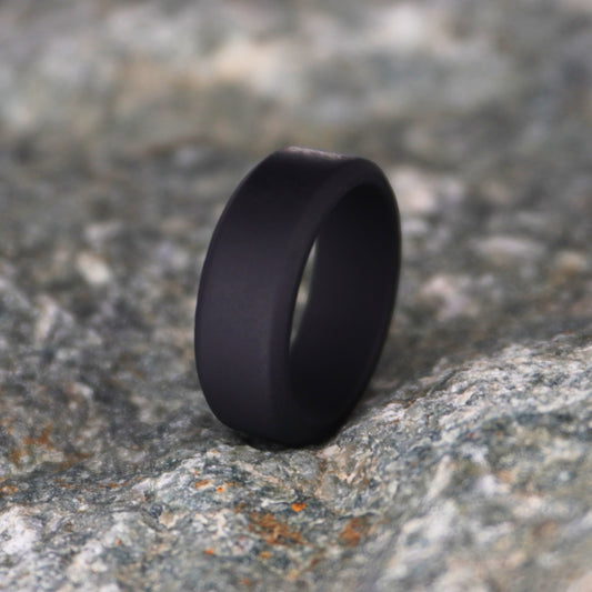 Black beveled silicone wedding ring, 8mm, by Forge and Lumber, designed for active lifestyles.