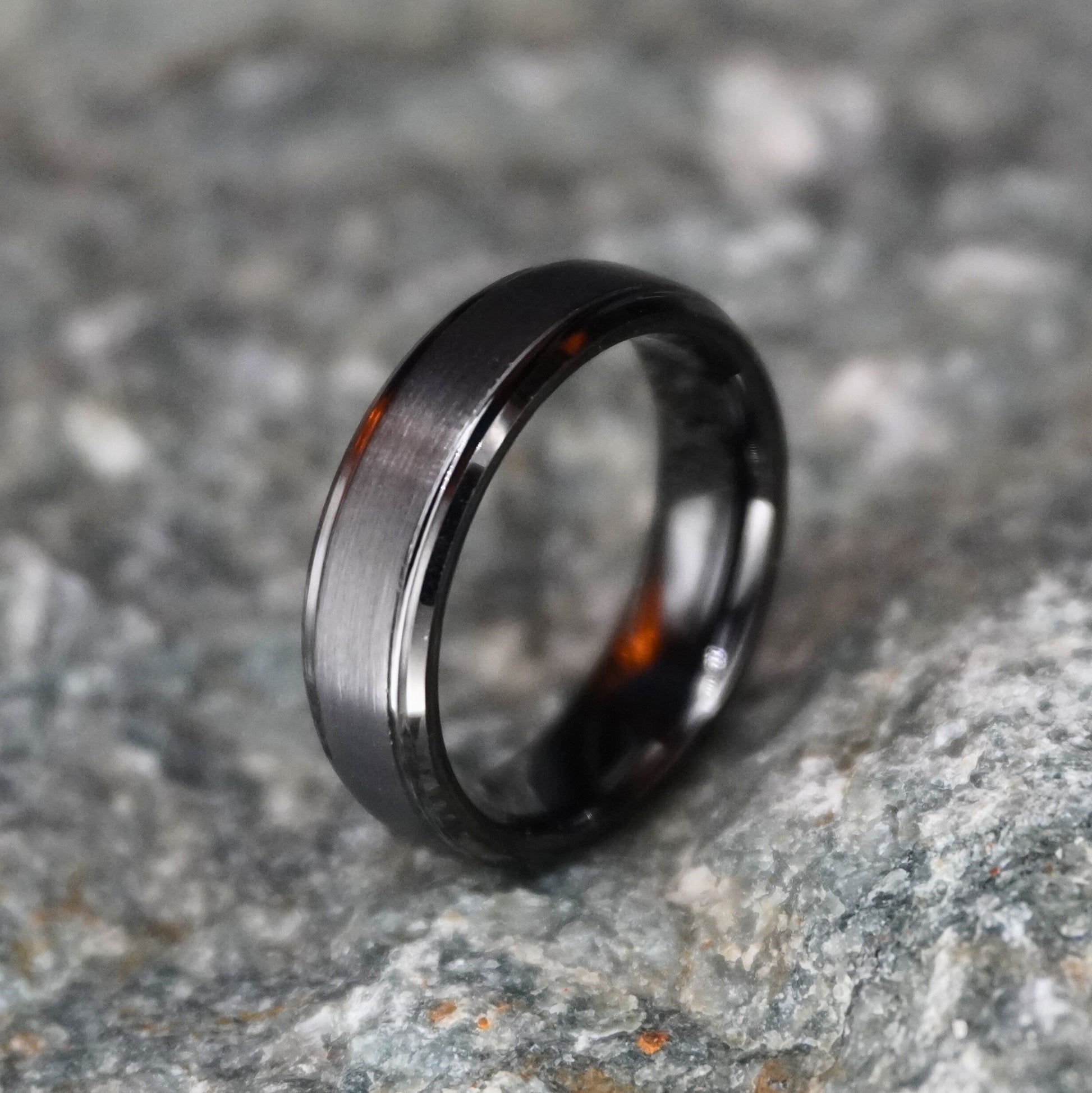 Beveled tungsten wedding band in black, size UK K / US 5, by Forge and Lumber.
