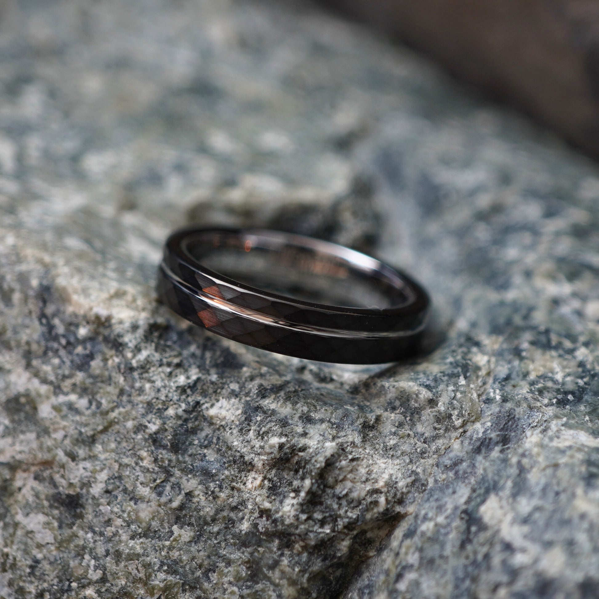 Silver 4mm band ring from Forge and Lumber, featuring a delicate design, engravable surface, and sleek finish.
