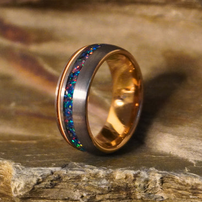 Artisan-made Opal Bridge ring by Forge and Lumber, featuring a double inlay of colorful opal and gold accents.