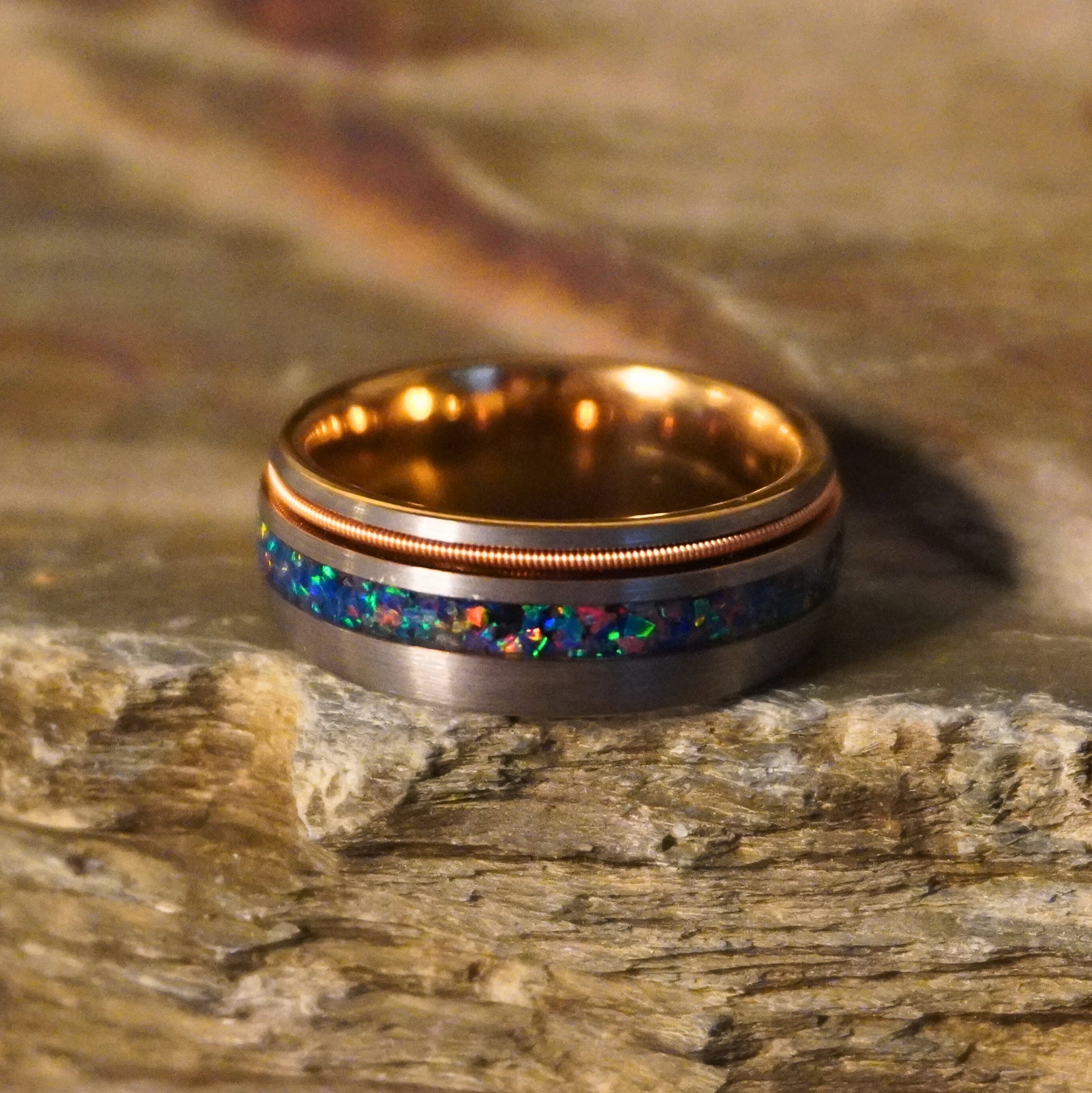 Gold and blue opal double-inlay wedding band by Forge and Lumber, 8mm width, artisan-made.