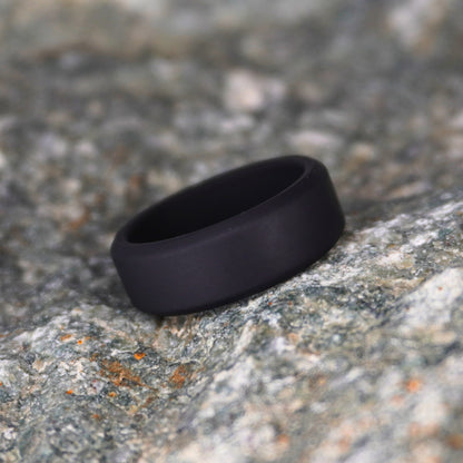 Black beveled silicone wedding ring, 8mm, by Forge and Lumber, designed for athletic and active lifestyles.