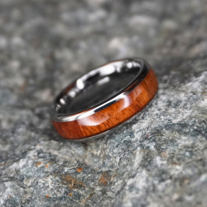 Acacia Koa wood tungsten ring with a 6mm silver band, featuring a polished finish and natural wood grain.