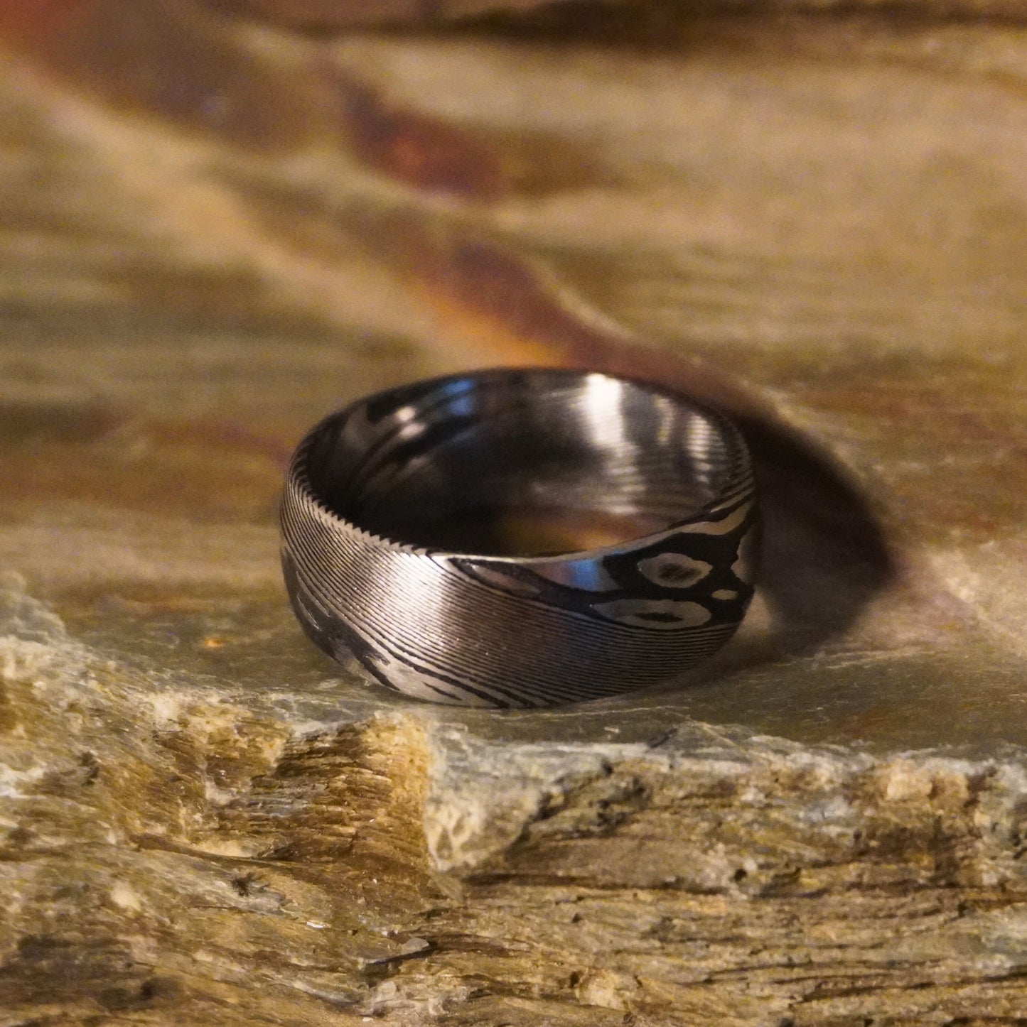 Bevelled black artisan crucible ring by Forge and Lumber, featuring intricate patterns, size UK O / US 7.