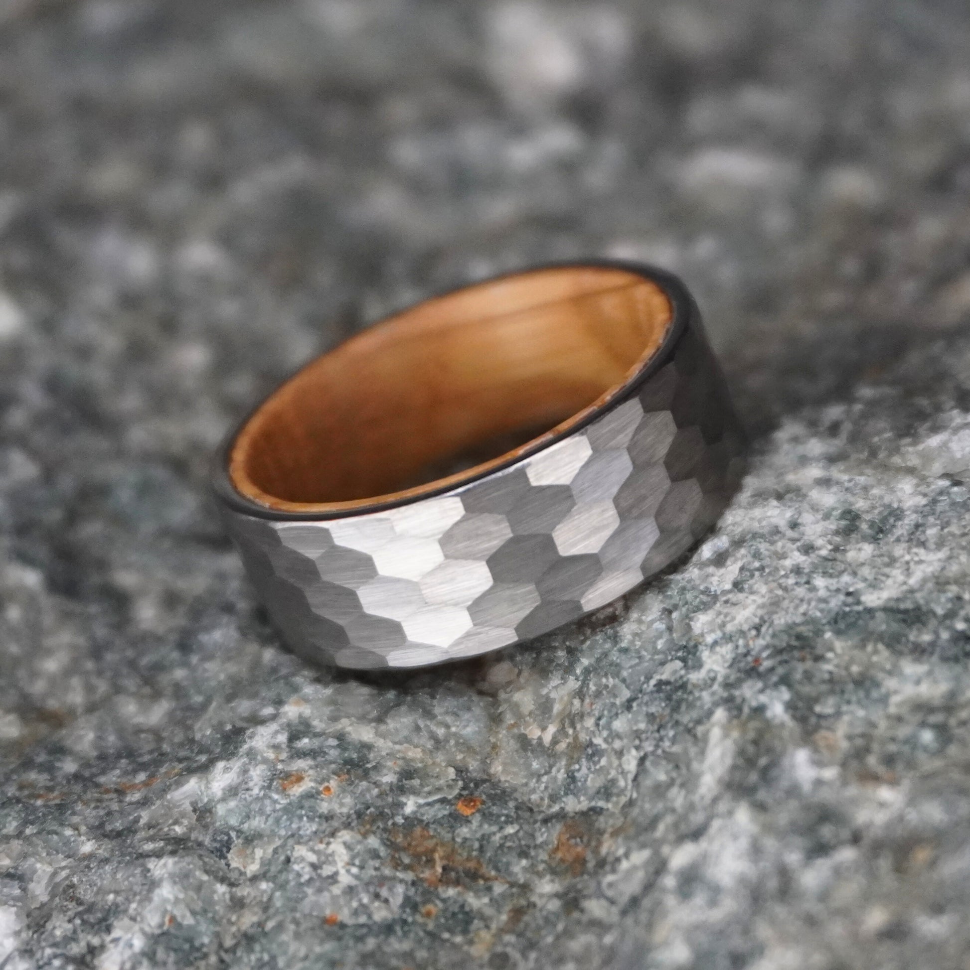 Hammered silver and black band ring with a polished finish, by Forge and Lumber. Size options available.