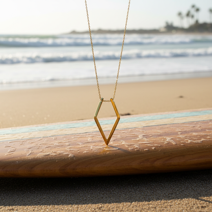Ring holder necklace holding a ring on its gold plated chain