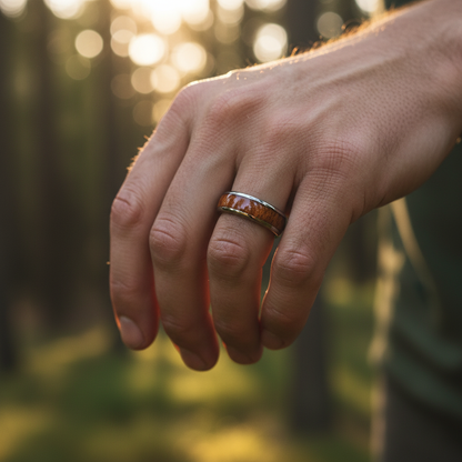 6mm Acacia wood wedding ring by Forge and Lumber, featuring a polished silver band.