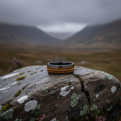Black ceramic wedding band with gold accents, The Fret by Forge and Lumber, size UK M / US 6.