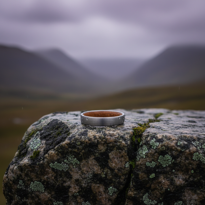 Silver 4mm wedding band with wooden inlay by Forge and Lumber, featuring a sleek and modern design.