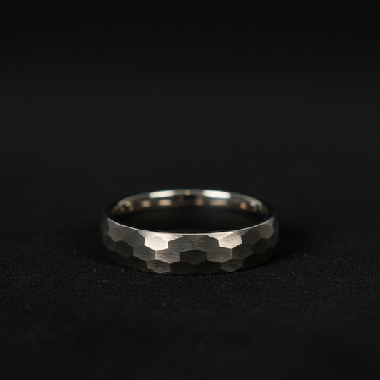 The Highlander ring: Forge and Lumber 6mm hammered titanium band.