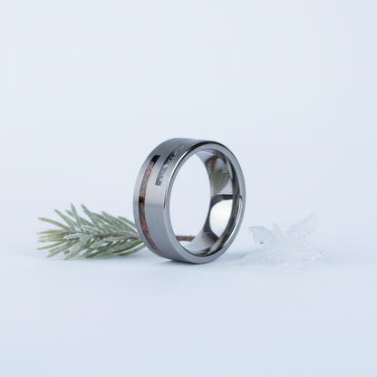 8mm silver tungsten ring inlaid with dinosaur bone by Forge and Lumber, featuring a cosmic design.