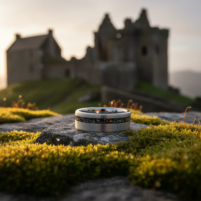 Forge and Lumber Nova 8mm ring on mossy stone. Durable, cosmic bestseller; Scottish ruins sunset.