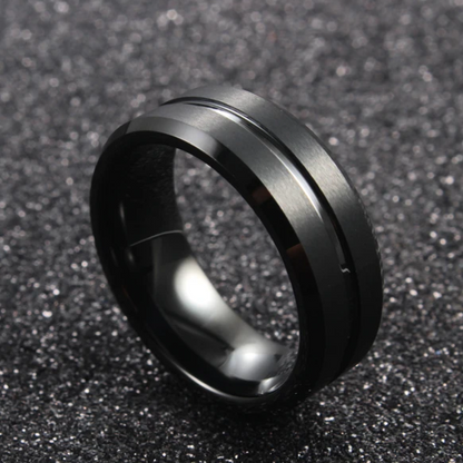 Black beveled ring by Forge and Lumber, 8mm width, available in sizes UK M, N, O (US 6, 6.5, 7).