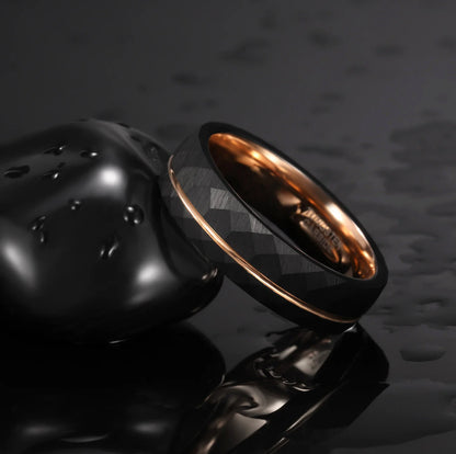 Black 6mm men's ring with a faceted design and rose gold inner band by Forge and Lumber.